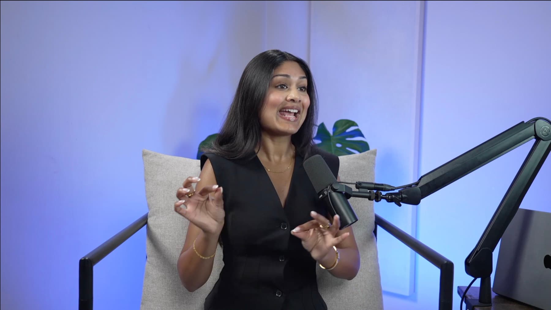 Reetu Maz speaking in a studio interview